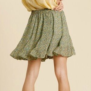 Umgee Sage green floral skirt. elastic waist. Size large. New with tags.